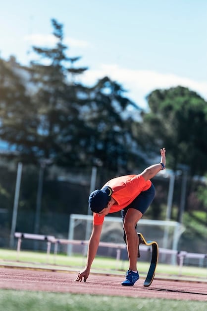 A photograph of an American track and field athlete sprinting during a race. The image should capture the speed, power, and determination of the athlete.