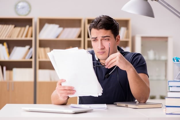 A college athlete sitting at a desk looking overwhelmed by the documents and contracts related to their NIL deals. The scene is set in a dorm room, with scattered papers and a laptop displaying financial spreadsheets. The athlete is rubbing their temples, indicating stress and confusion about managing their newfound financial responsibilities.