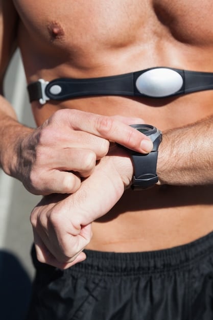 A close-up shot of a wearable sensor being used to monitor an athlete's movement. The focus is on the sensor and the data it is collecting, with blurred background showing the athlete in motion during a workout.