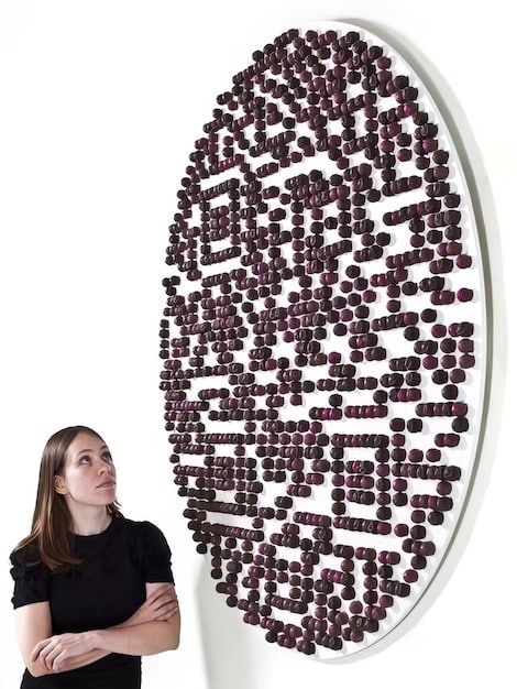 A conceptual image featuring a maze with data streams flowing through it and a magnifying glass highlighting 
