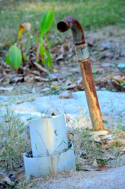 A close-up shot of a water pipe leaking, representing the poor condition of the nation's water infrastructure and the urgent need for repairs and upgrades.