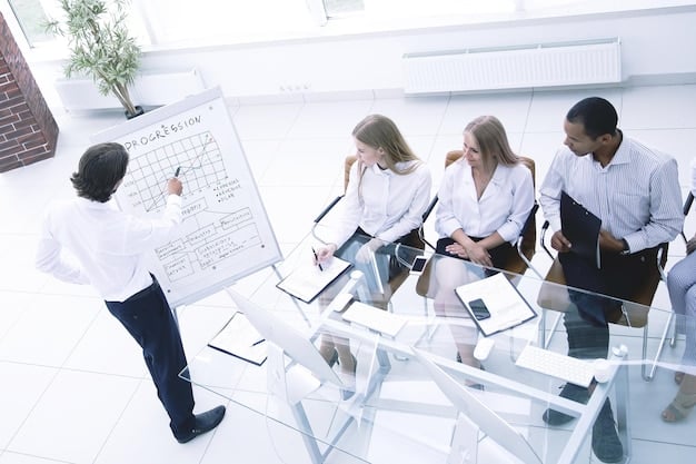 A diverse group of business professionals sitting around a conference table discussing a complex data flow diagram, with compliance documents visible.
