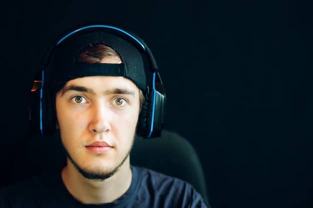 A close-up shot of a professional esports player's intense face, wearing a headset, with bright, focused eyes reflecting the screen. The background is blurred but shows the vibrant lights of a gaming setup or arena, conveying the intensity and skill involved in competitive gaming and the investment in individual talent.